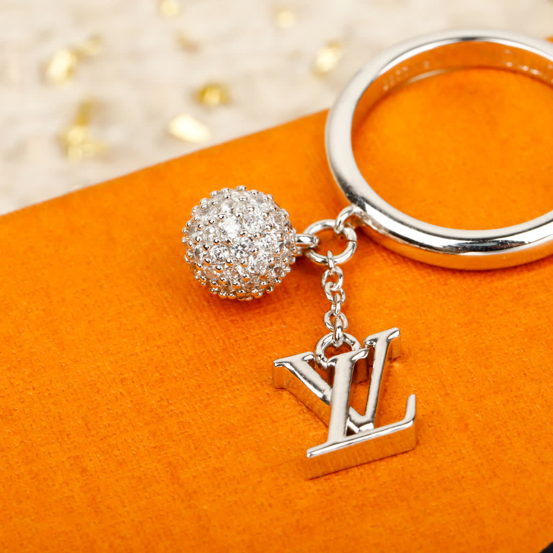 Louis Vuitton Silver Ring with Logo Charm